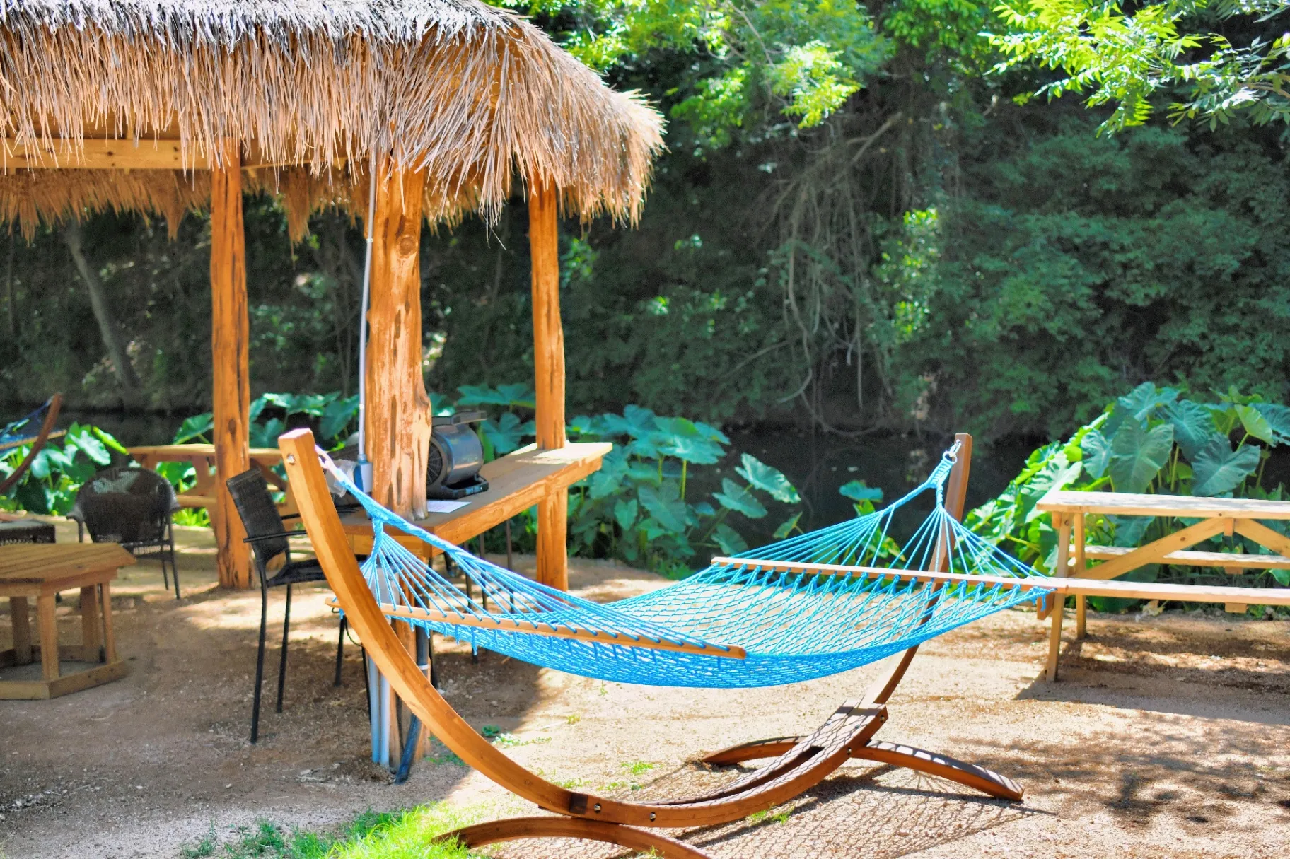 Cabana with hammock by the creek