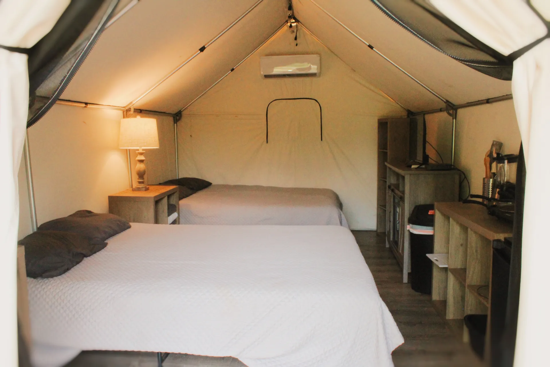 Glamping Cabin interior with beds