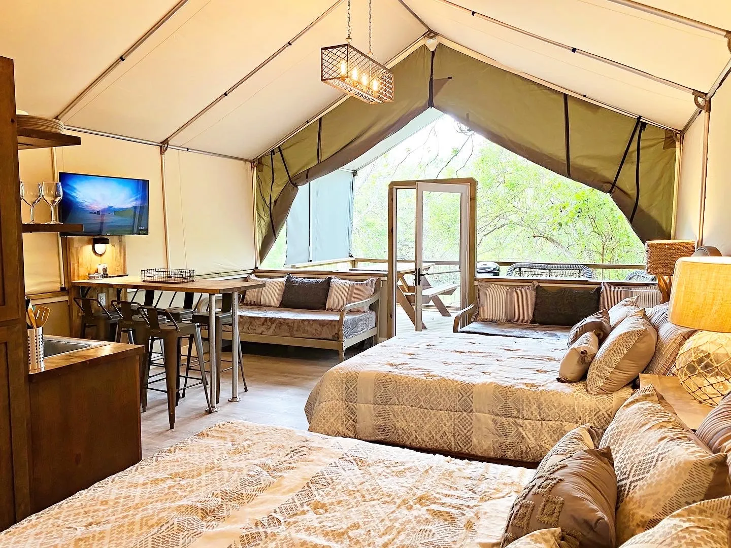 Glamping interior with comfortable bed