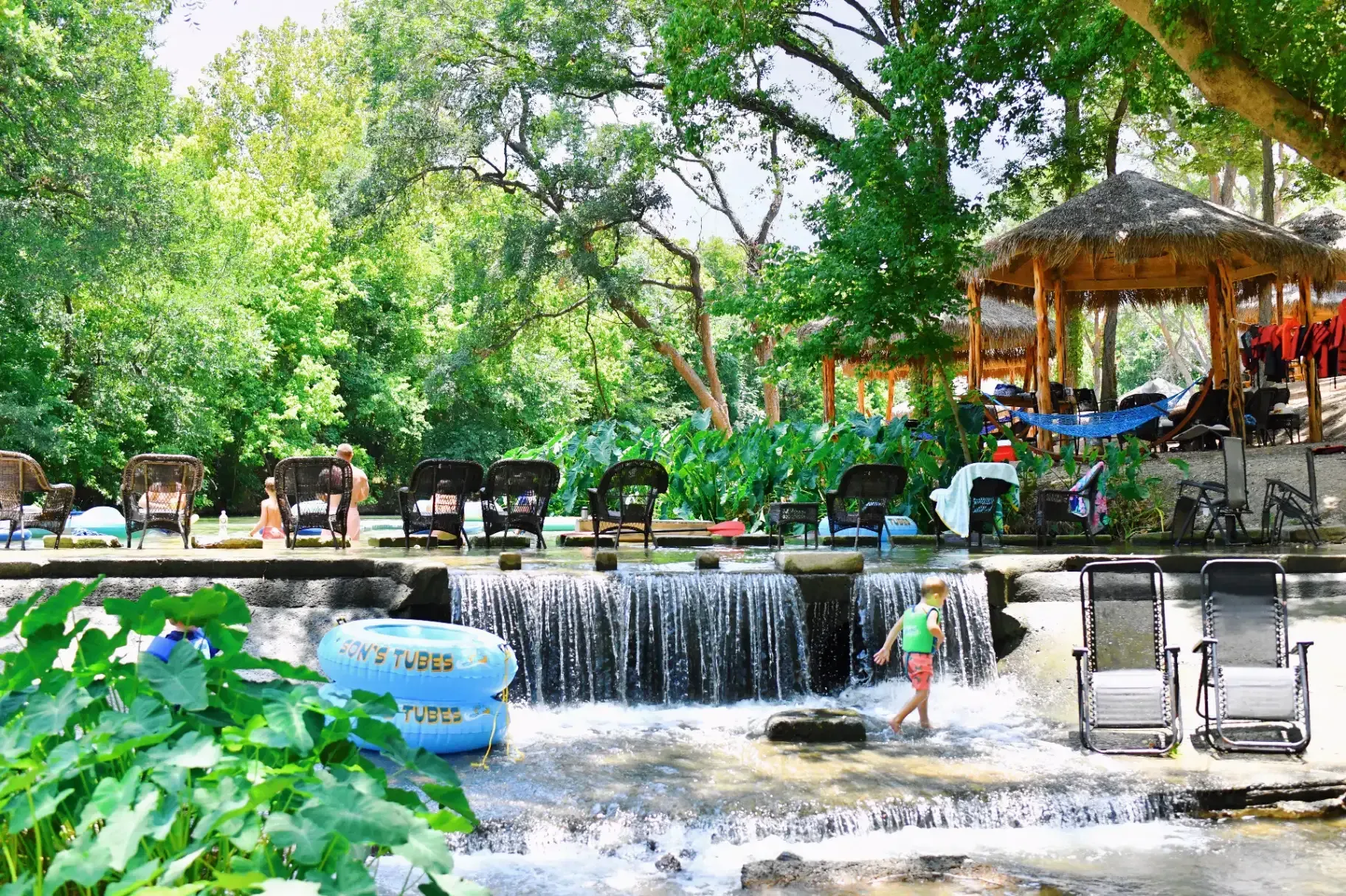Families enjoying Cibolo Creek at Son's Rio Cibolo