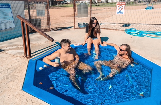 Family relaxing in hot tub