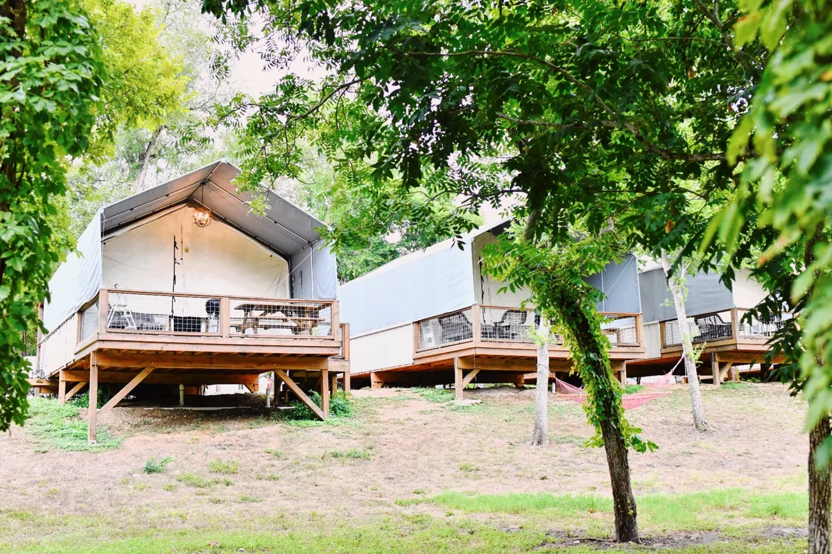 Waterfront glamping cabin exterior row in the Texas Hill Country